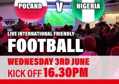 Bar venue poster advertising a Poland vs Nigeria live international football match, with date, kick-off time, and venue Mamúška! Restaurant and Bar.